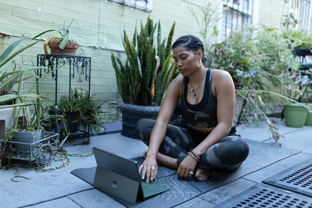 Woman analyzing survey data on a laptop