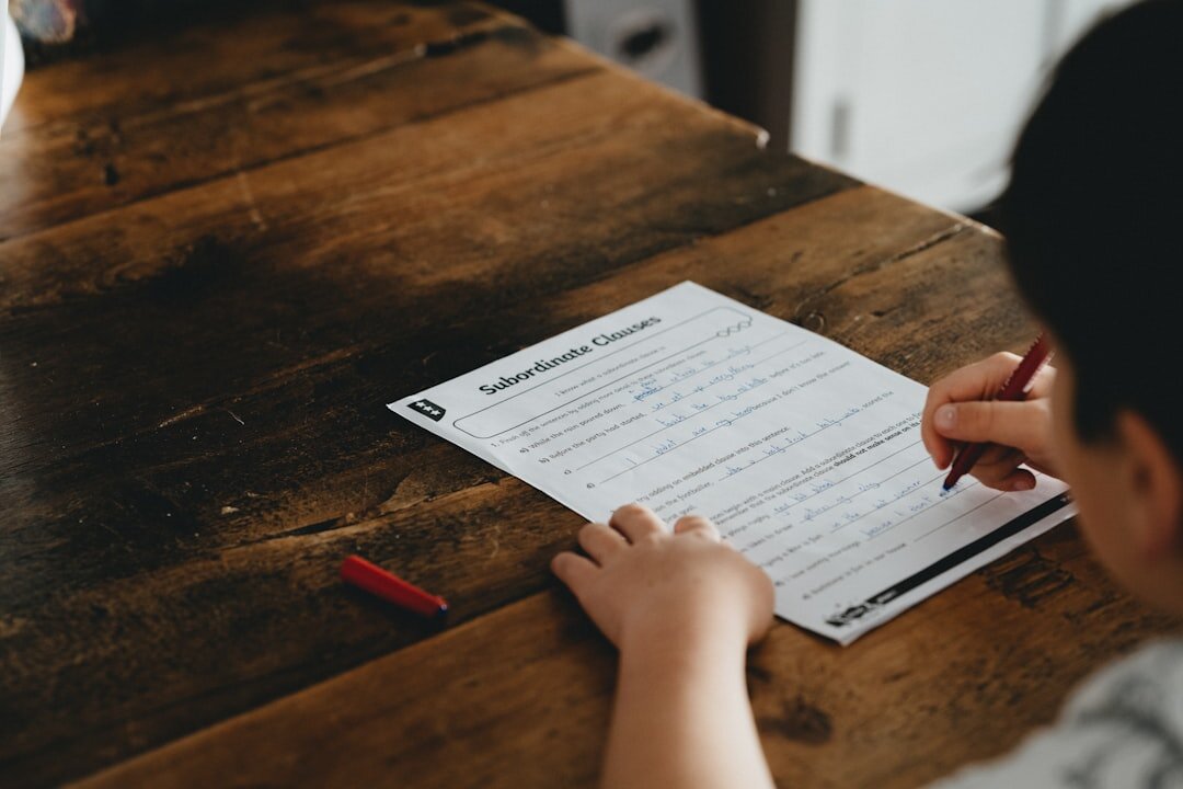 man filling out survey form